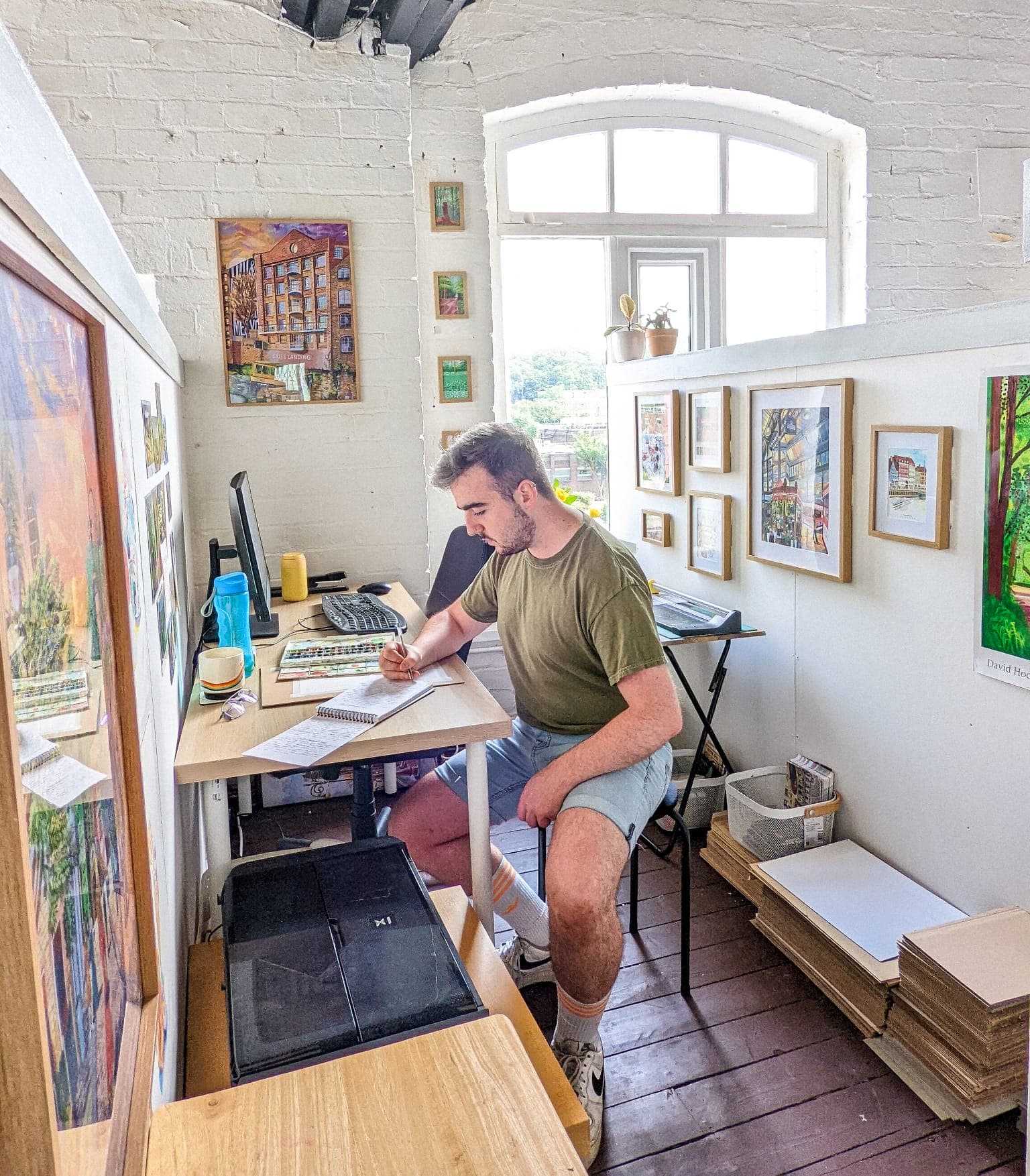 Zac, an Open Source Arts studio member, at work