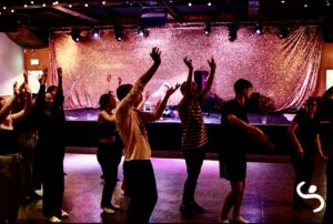 Moving together at a Synergy Mindful Movement event.