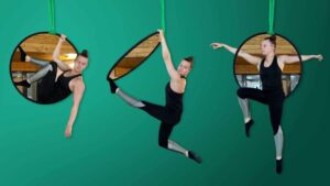 Rebecca performing suspended poses in a circular aerial hoop against a green background.